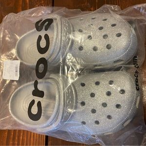 Crocs in Silver glitter, size 7.